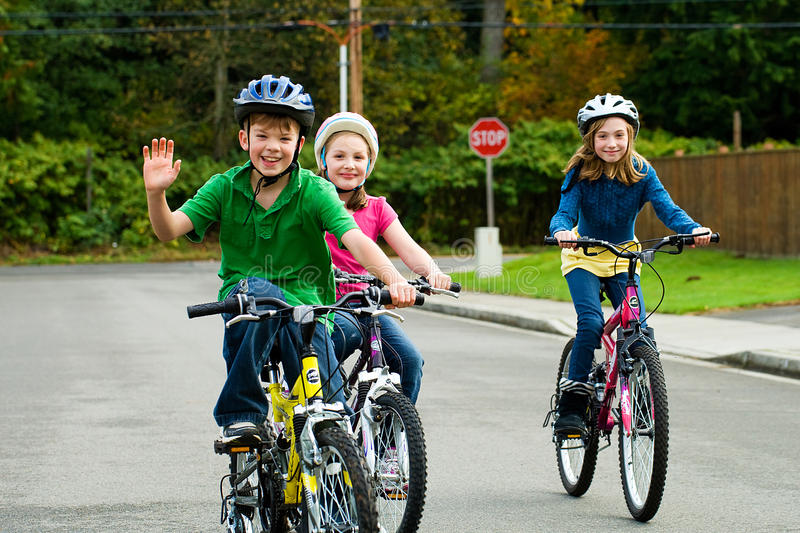 happy kids riding bikes 22095492